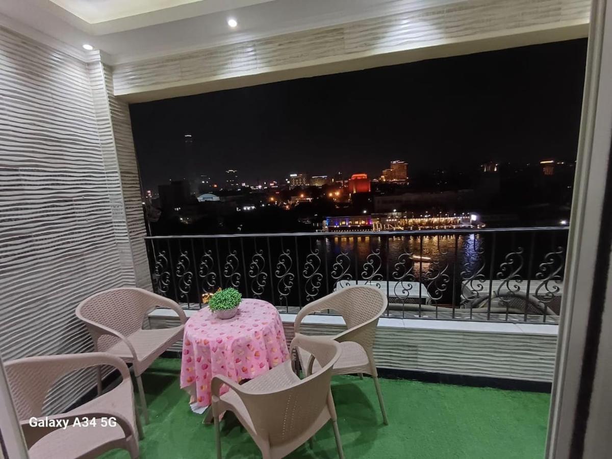 شقه علي النيل View كامل للنيل وبرج القاهره *